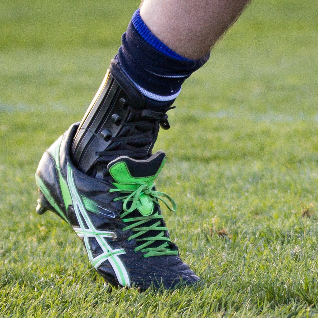 George Nott of Sale Sharks Rugby Club wearing the Benecare EXO Ankle Brace.